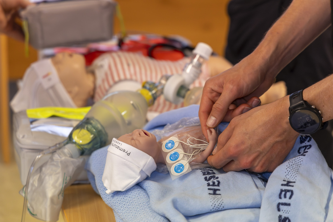Doctor treating premature baby