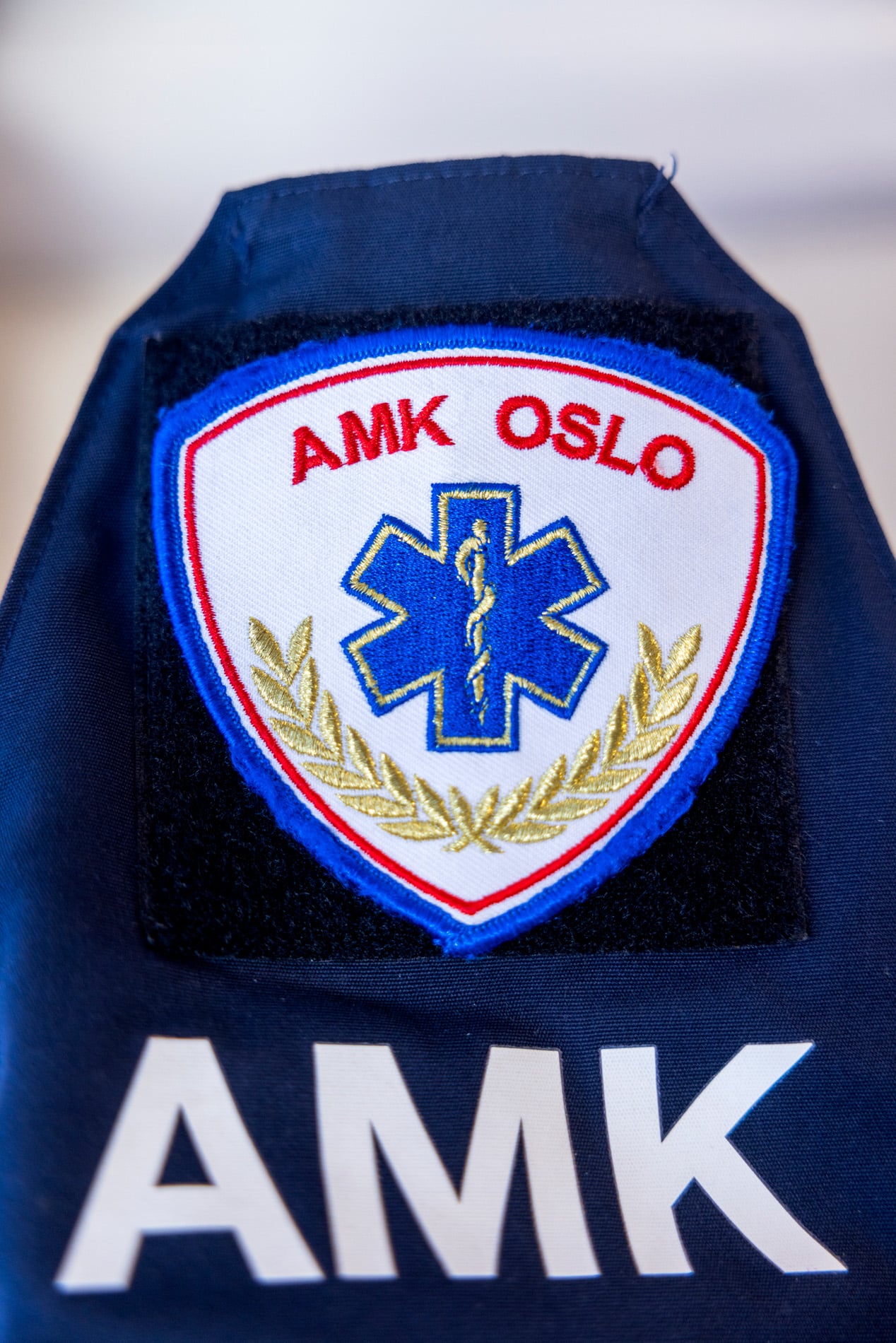 AMK-emblem på genser